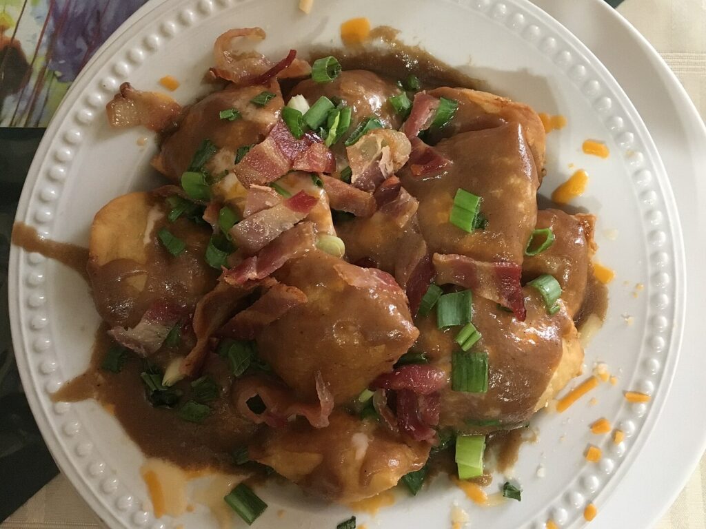 Canadian poutine made with pierogie instead of French fries at a diner in Swift Creek, Canada