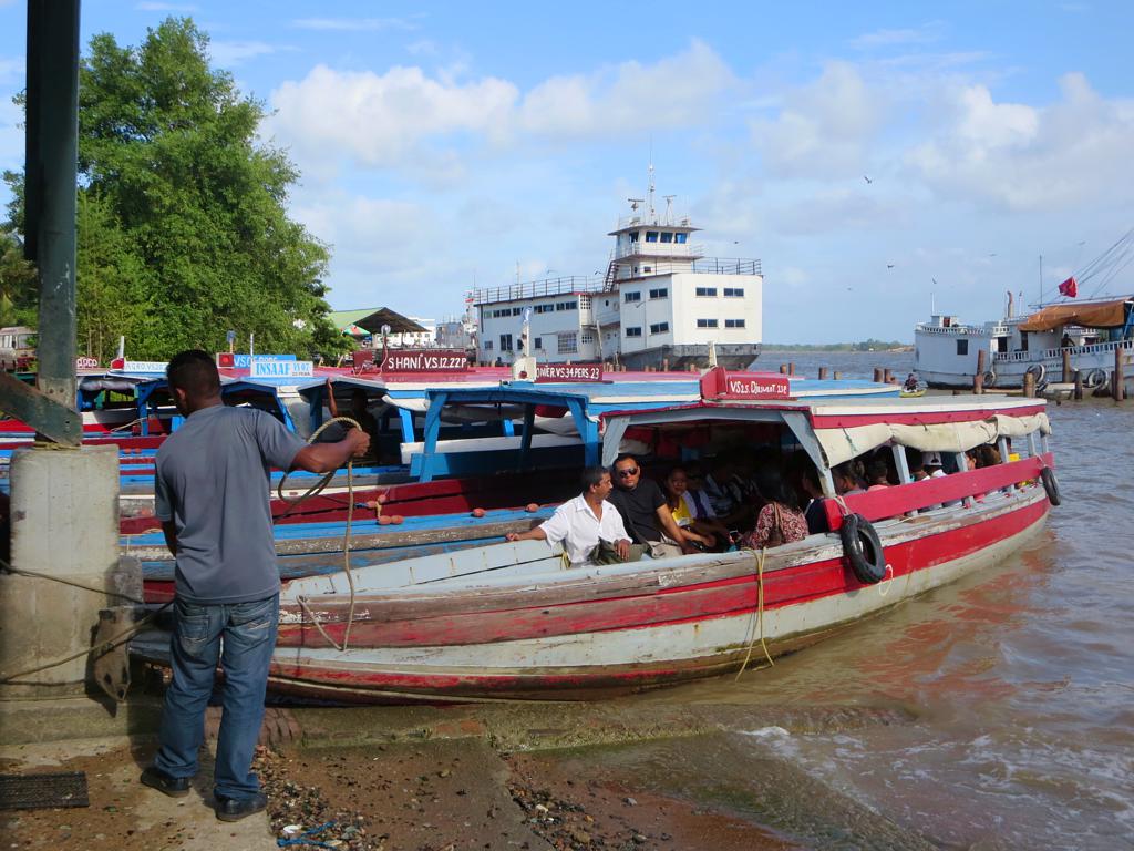 Small ferries take passengers across the Suriname River from Paramaribo to the Commewijne district.