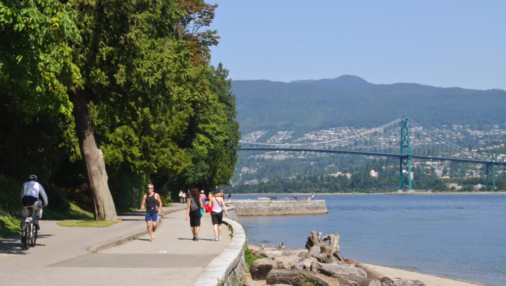 Stanley Park, located at the tip of the peninsula that is the core of Vancouver, had originally been set aside for a fort, to protect Canada's main Pacific port of Vancouver from a possible US invasion in the 19th Century. (After all, both the US and the UK were vying for the control of Vancouver, before it became part of a new Canada.) The land became the park that it is today, when the US invasion threat dissipated; today, the main US invasion here is in the form of tourism. Stanley Park is named after Lord Stanley, Canada's first Governor-General; National Hockey League's Stanley Cup is also named after it. (Sadly the Vancouver Canucks have never been able to win the Stanley Cup - 2012 saw the Canucks get cut down by none other than my Los Angeles's own Kings, who went on to win it.) The Seawall is always a nice place for a walk, a jog, or a ride on a bicycle. Of course, the views of Lions Gate Bridge, which is often considered to be the little sister of San Francisco's Golden Gate Bridge, are awesome, as are the views of North Vancouver hillside mansions that were built fairly recently for the wealthy Asian immigrants.