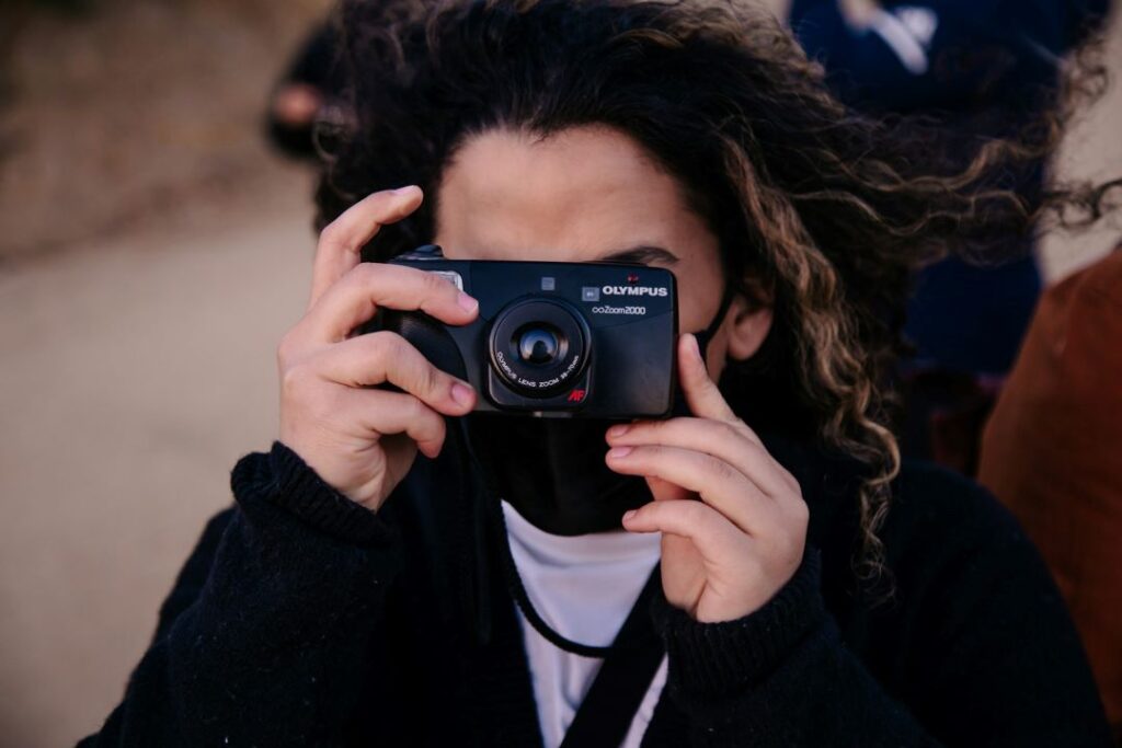 woman taking pictures