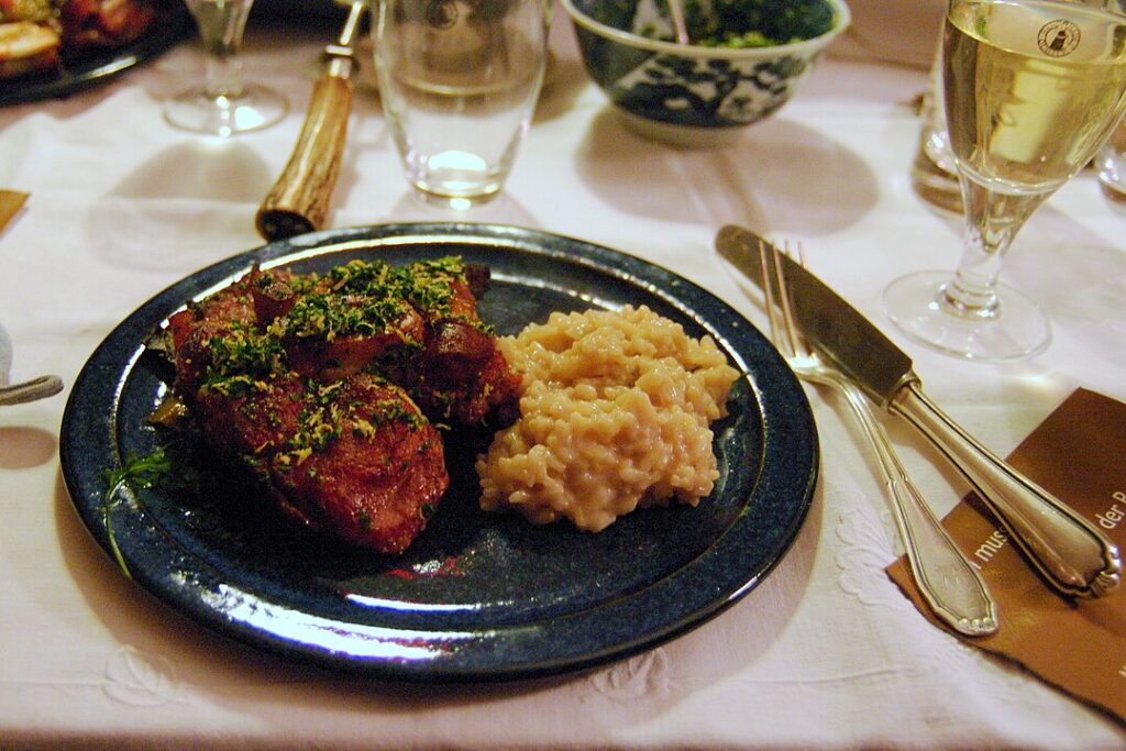 Ossobuco served with risotto alla milanese