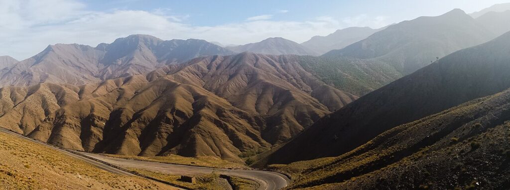 On the way to Aït Benhaddou. The Atlas Mountains is a mountain range across the northwestern stretch of Africa extending about 2,500 km through Algeria, Morocco and Tunisia.